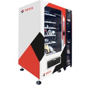 Spiralautomat in Weiß, Rot und Schwarz, gefüllt mit verschiedenen Produkten hinter einer Glasfront.  